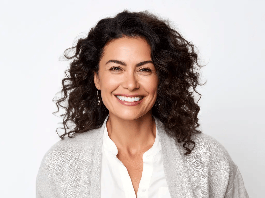 happy smiling woman with hands behind her back happy smiling woman with hands behind her back